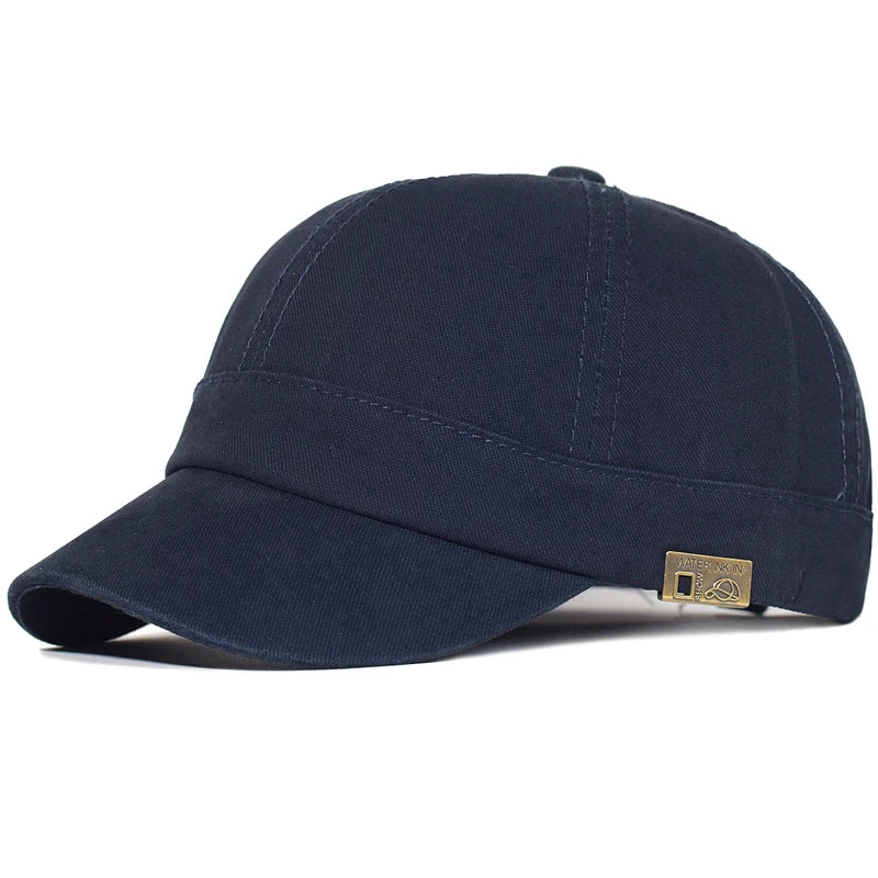 Casquette en coton bleu foncé pour homme, visière courbée, écusson logo sur le côté