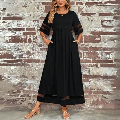 Robe midi noire évasée, manches mi-longues ajourées, encolure ronde