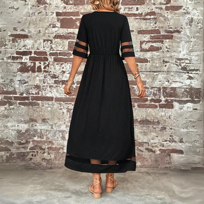 Robe midi noire au dos, taille froncée, manches mi-longues avec bandes ajourées