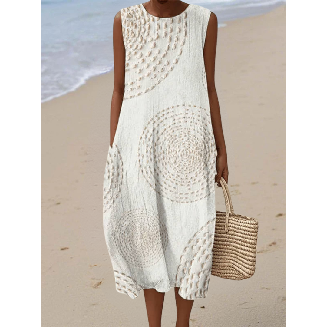 Robe rétro sans manches beige à encolure ronde, motif circulaire et volant léger