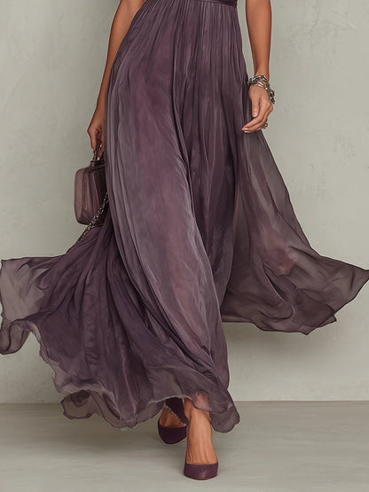 Robe longue violette fluide, jupe évasée et manches courtes bouffantes