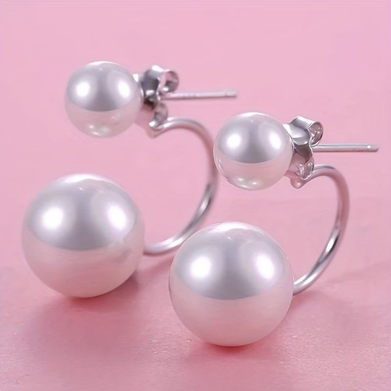 Boucles d’oreilles pendantes doubles perles nacrées, tige et fermoir papillon