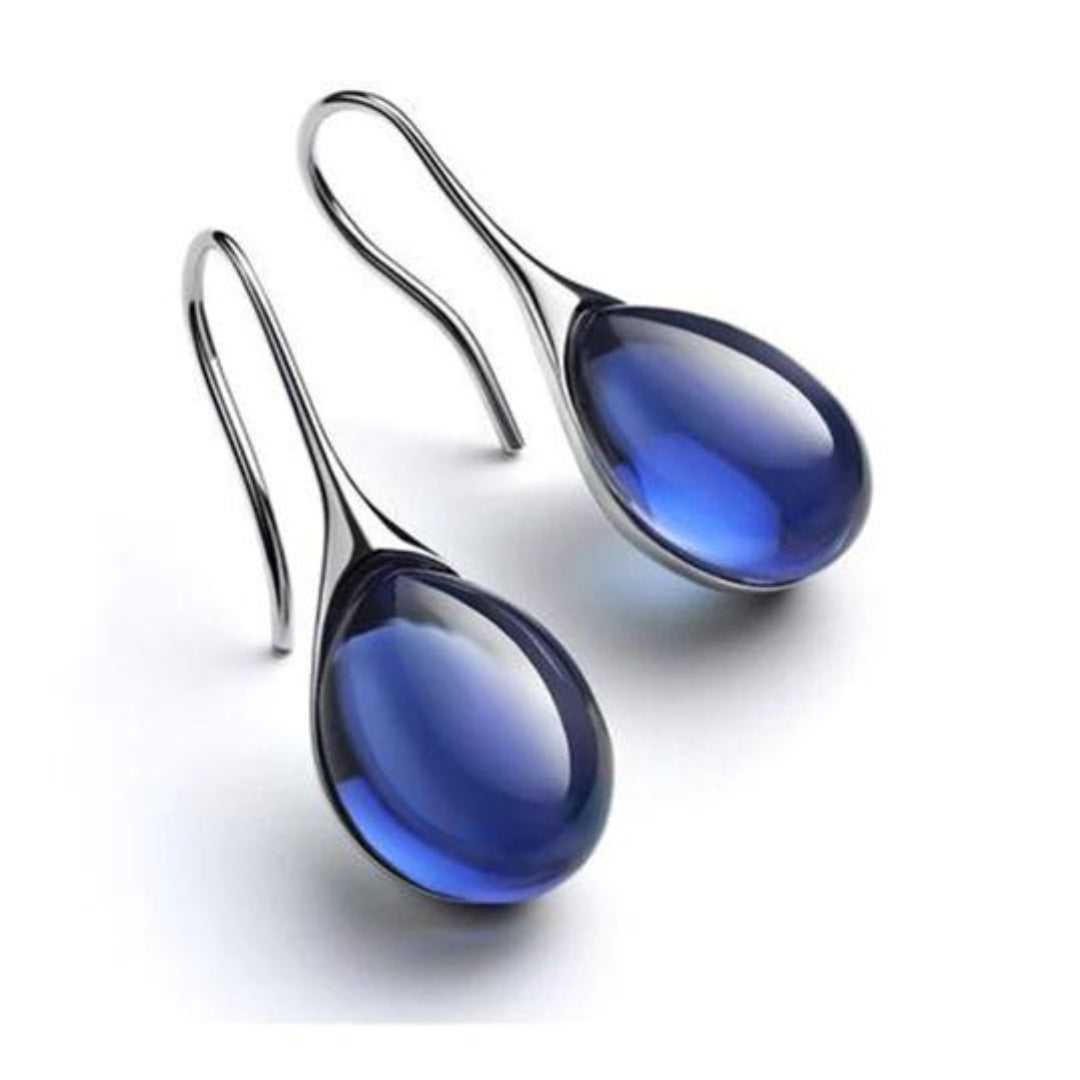 Boucles d’oreilles pendantes argentées à goutte en cristal bleu foncé