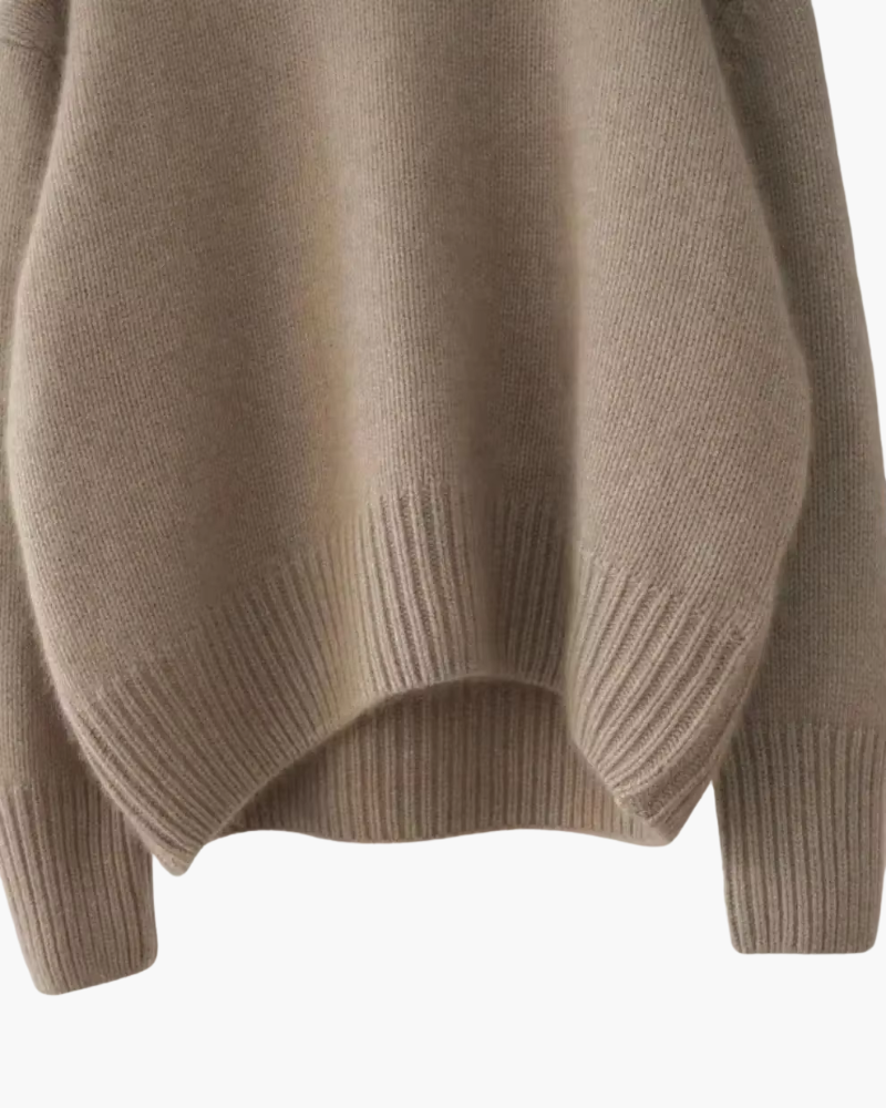 Bas du pull en maille, beige clair, bord côtelé et ourlet évasé