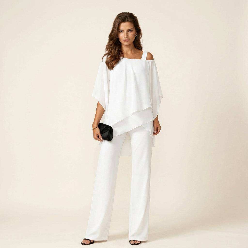 Ensemble fluide respirant blanc : top asymétrique à épaules dénudées et pantalon droit