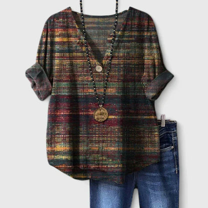 Blouse multicolore imprimée, manches larges, encolure V boutonnée, pendentif
