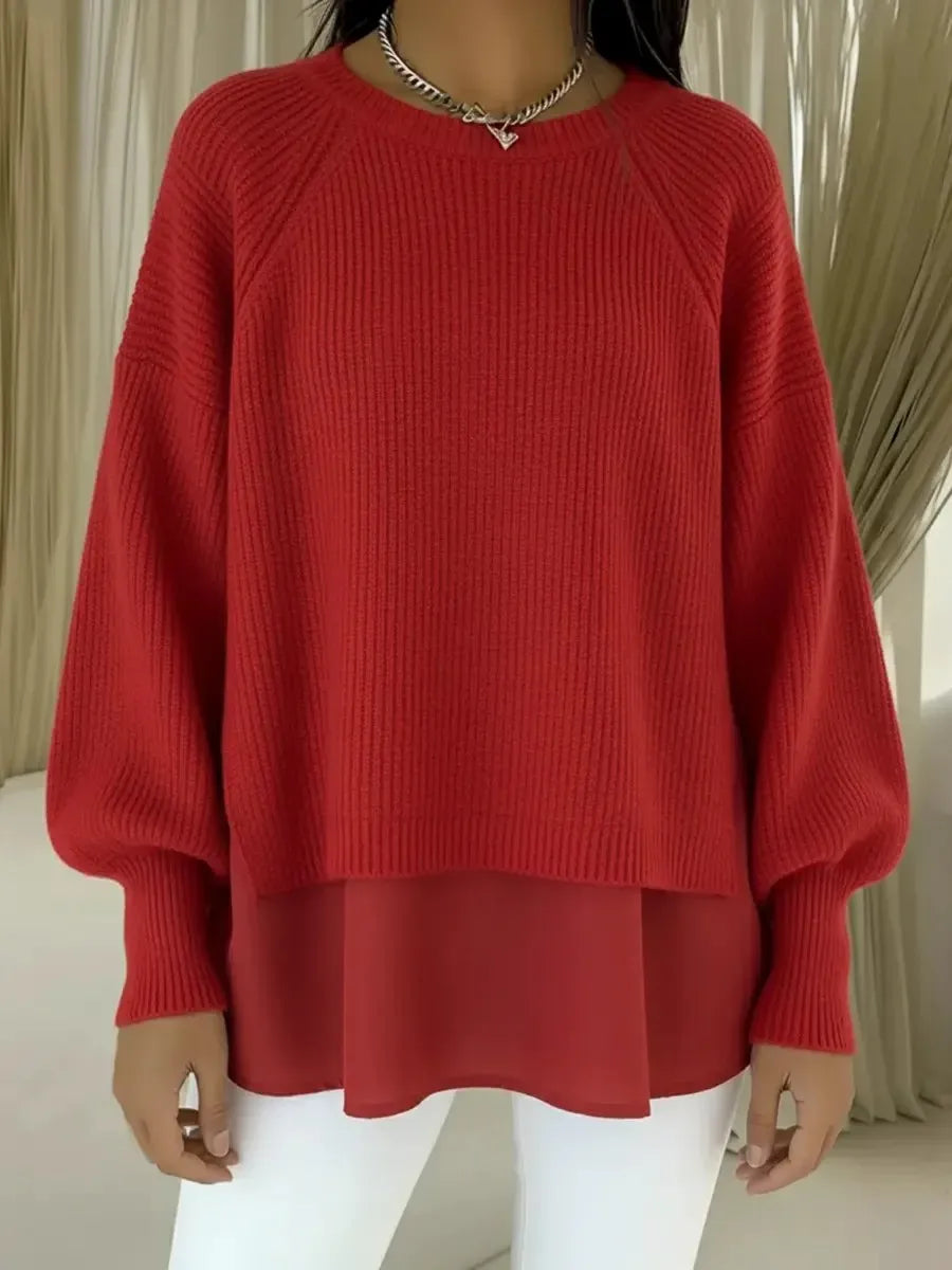 Pull en tricot rouge, col rond côtelé, manches bouffantes, bas superposé