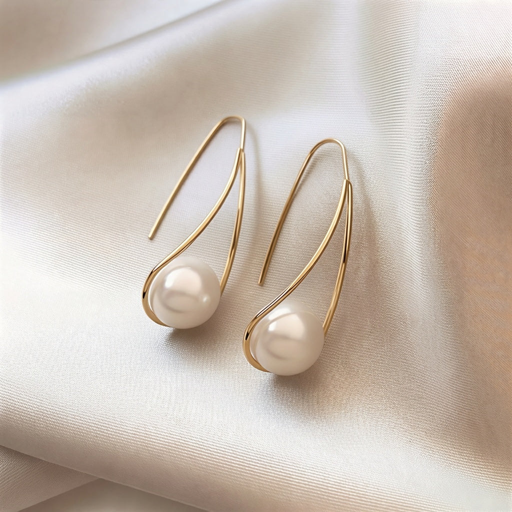 Boucles d’oreilles pendantes à perle blanche, monture dorée, anneau fin