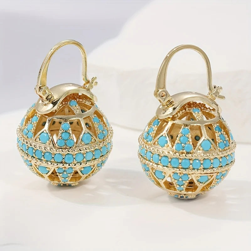 Boucles d’oreilles mandala turquoise doré, motif ajouré et perles bleu