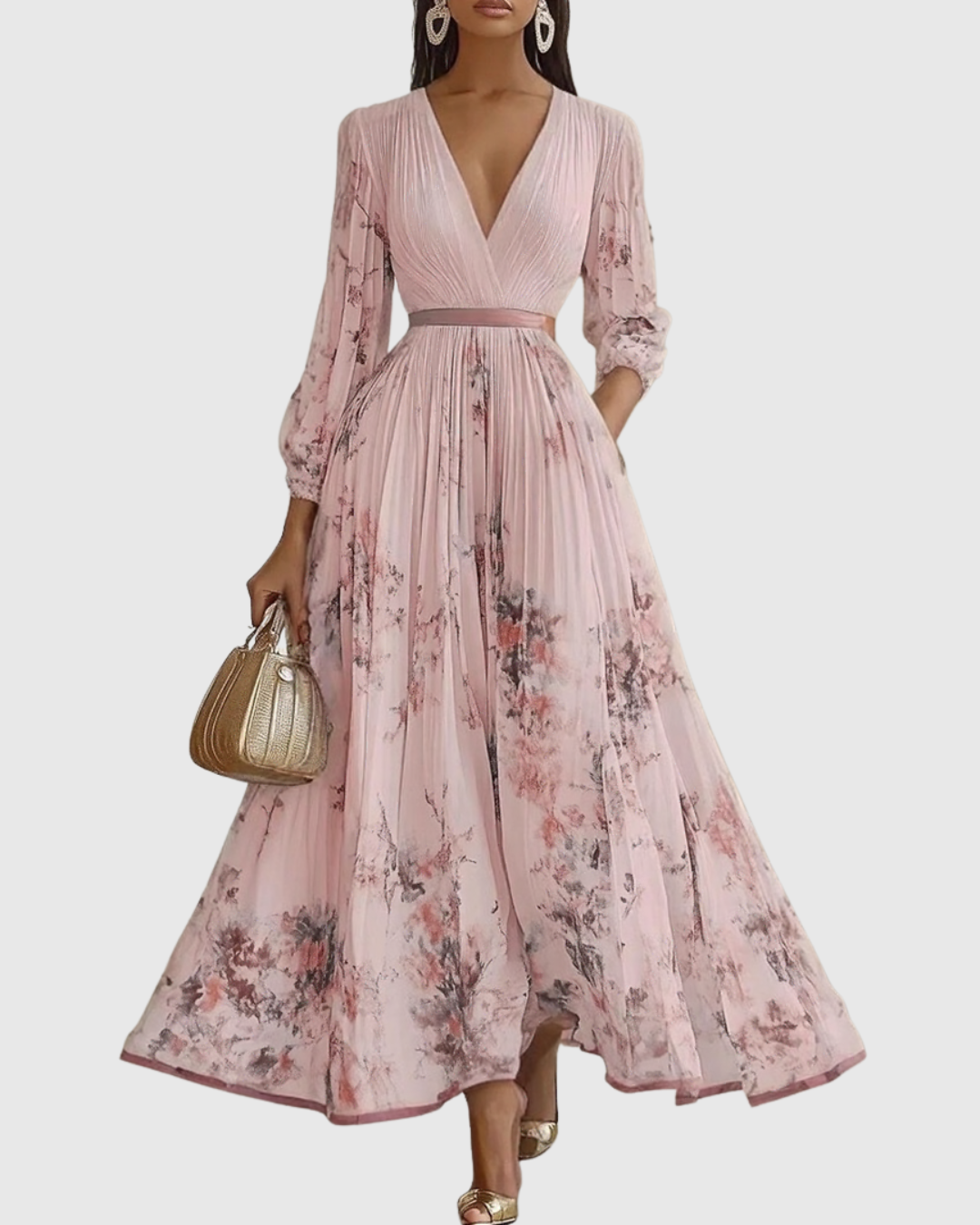 Robe longue plissée manches longues, encolure V, imprimé floral rose sur fond clair.
