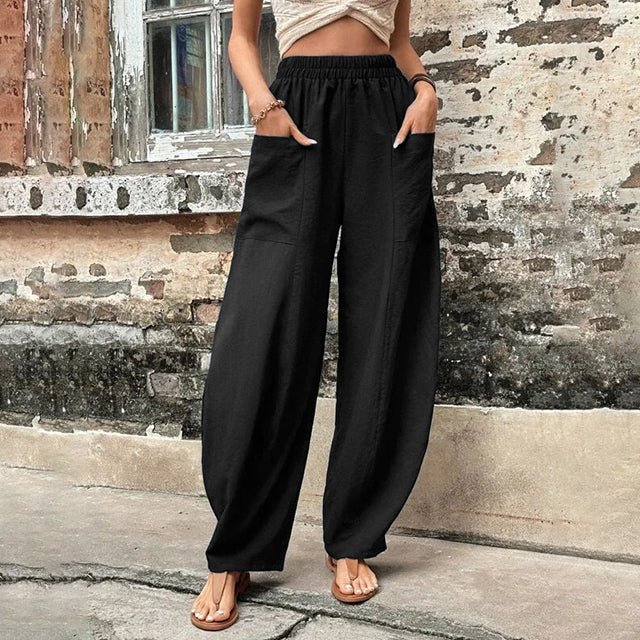 Pantalon fluide noir à taille élastique, jambes larges, coupe décontractée