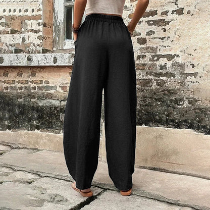 Pantalon fluide noir à taille froncée, jambes amples, tombé léger