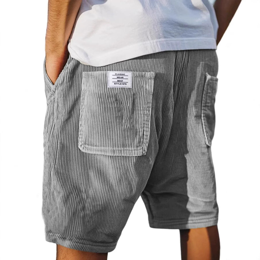Short en velours côtelé gris, vue dos, poche plaquée et étiquette au niveau de la taille
