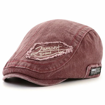 Casquette en denim rose avec écusson Damont brodé sur le devant