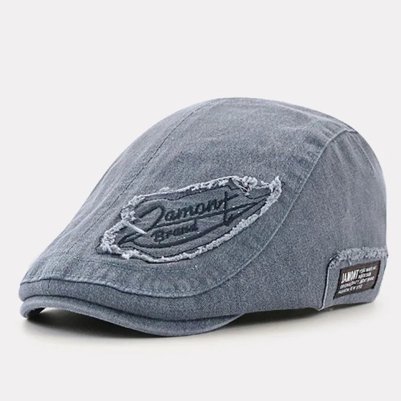 Casquette en denim bleu-gris avec écusson Damont brodé sur le devant