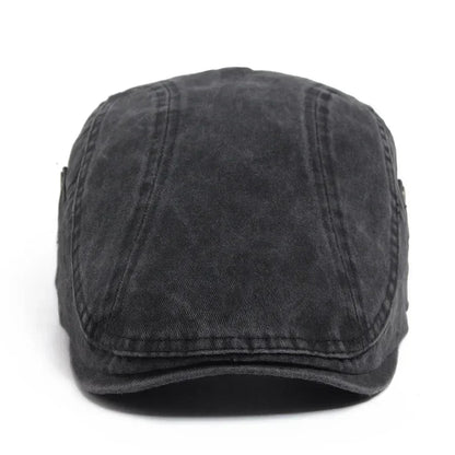 Casquette vintage homme gris foncé, vue de dessus, couture centrale et forme arrondie.