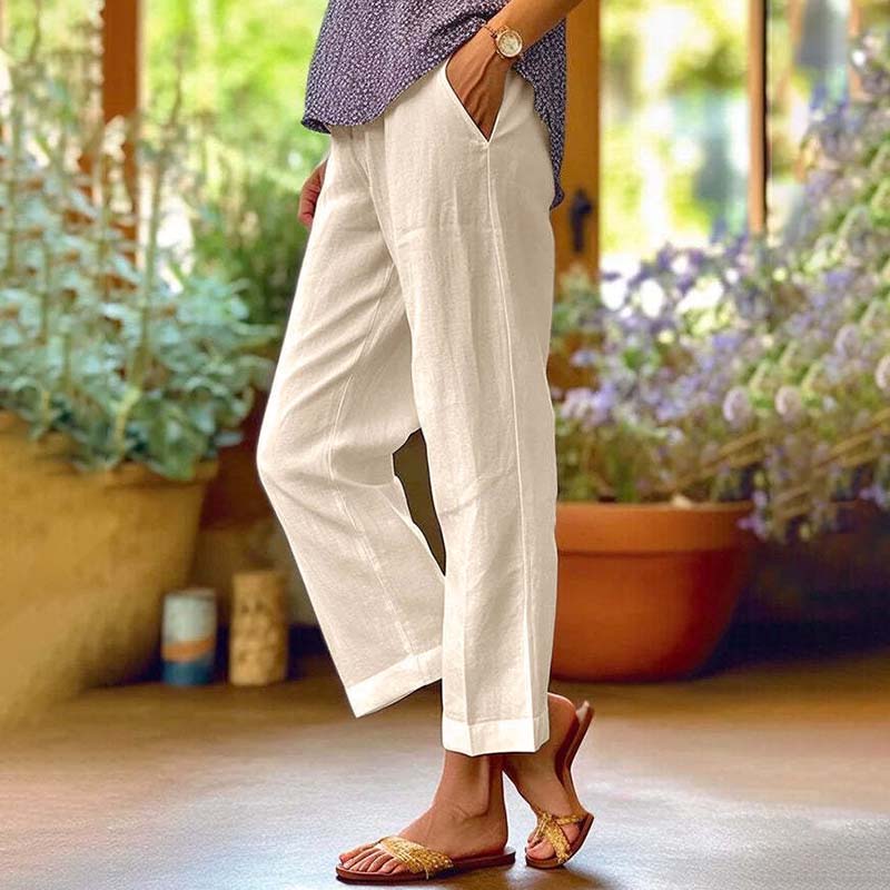 Pantalon ample décontracté blanc cassé, jambe droite, poches visibles