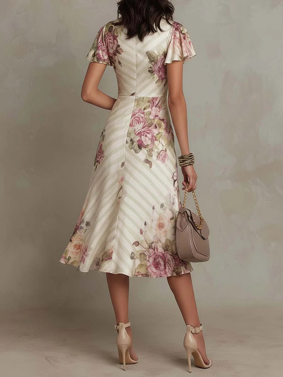 Robe midi satin crème à rayures fines et fleurs roses rétro, manches courtes.