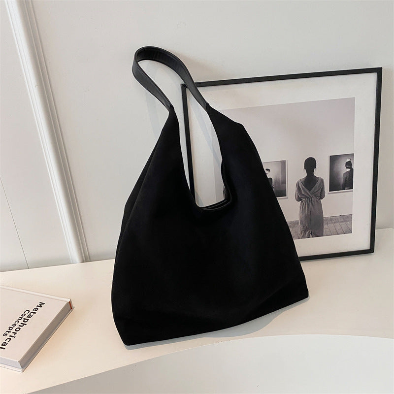 Cabas en daim Sena noir, anses courtes, forme de sac hobo