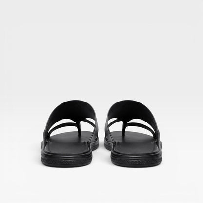 Sandales en cuir noires à enfiler, brides en V, semelle texturée