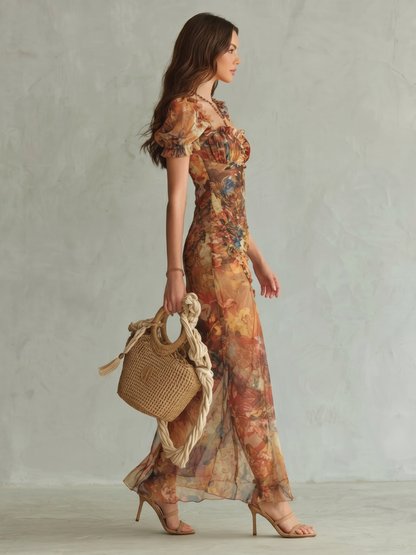 Robe midi fendue multicolore, encolure froncée et manches volantées, vue de profil