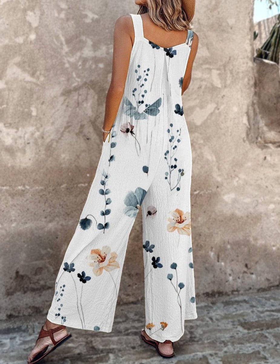 Combinaison blanche sans manches à jambes larges, fleurs bleues et touches marron
