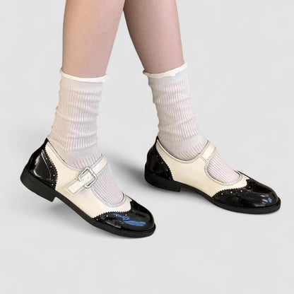 Chaussures de bébé contrastées Gabrielle™ noires, crème et blanc, bride à boucle