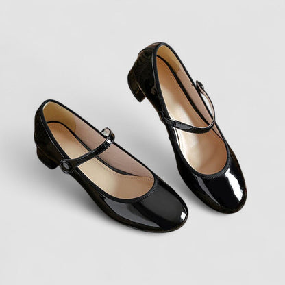 Ballerines rétro Roxane™ noires, dessus verni, bride à boucle.