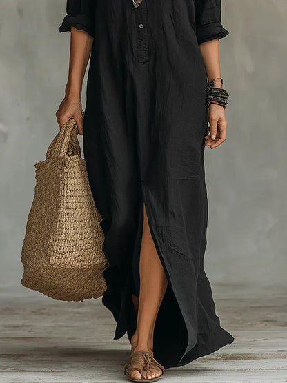 Robe maxi ample noire à boutons, jupe longue avec fente et poignets volantés