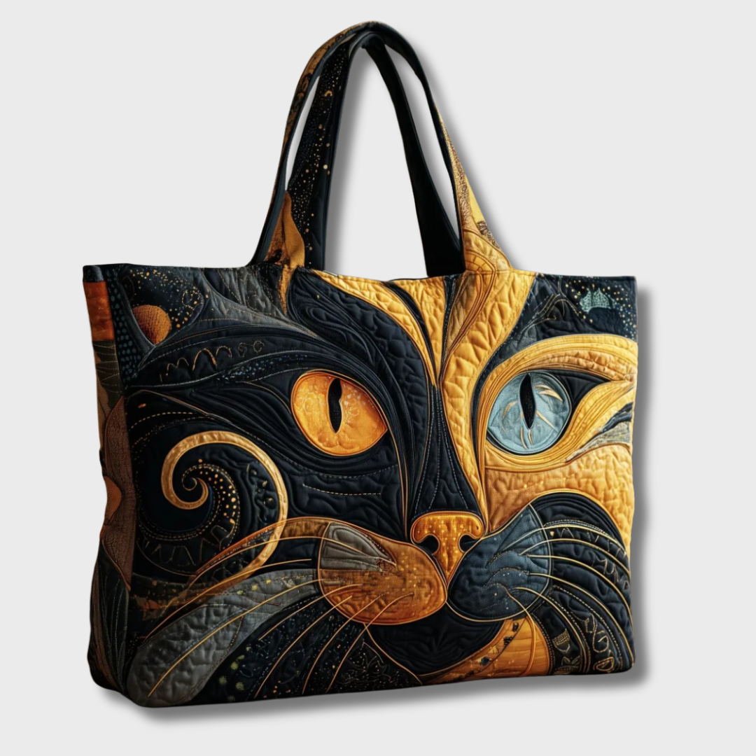 Sac souple Freya en tissu sombre, motif chat en appliqués dorés, anses longues