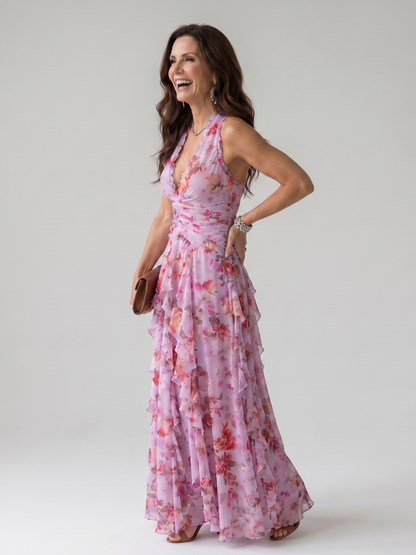 Robe longue fleurie rose, col halter et corsage drapé, jupe évasée