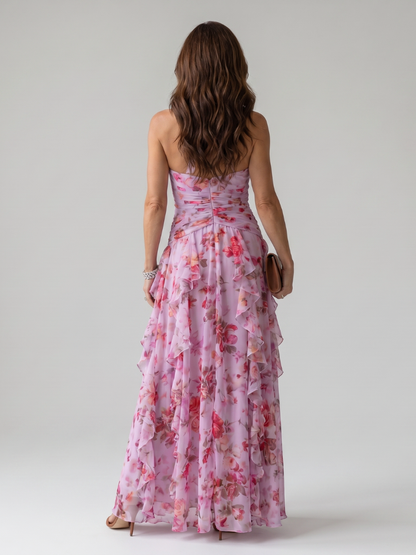 Robe longue fleurie rose, dos nu, col halter et corsage drapé