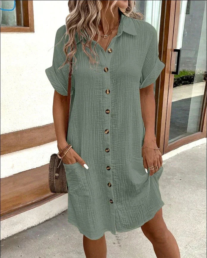 Robe polo oversize verte, col, manches courtes, boutonnage, poches latérales