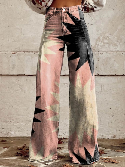 Pantalon bohème rose imprimé graphique, taille haute à patte boutonnée, jambes évasées.