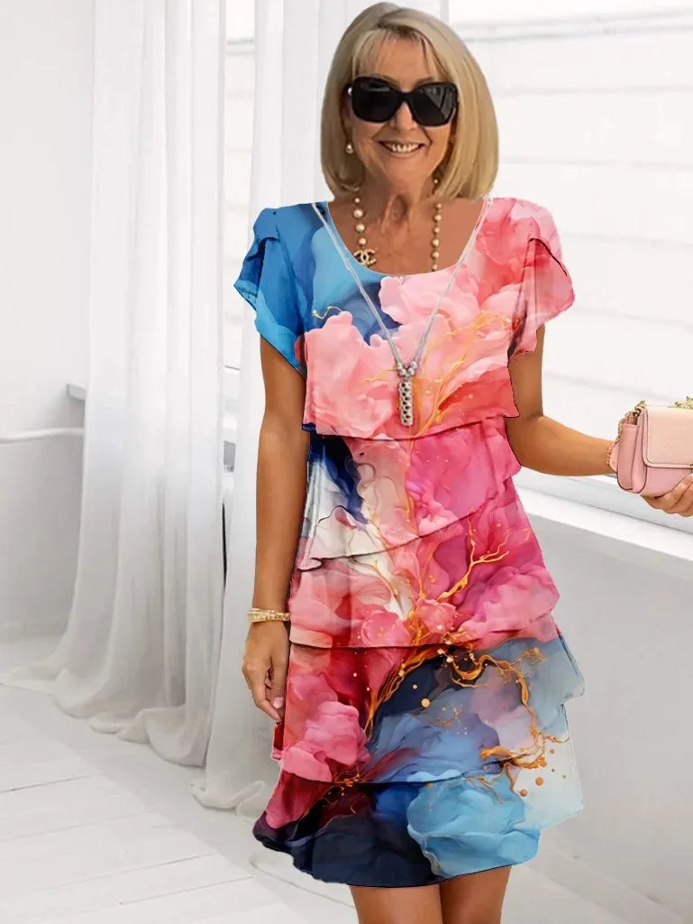 Robe fluide à volants roses et bleus, encolure dégagée, manches courtes volantées