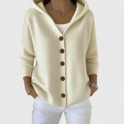 Cardigan à capuche beige clair à boutons, manches longues, maille douce.