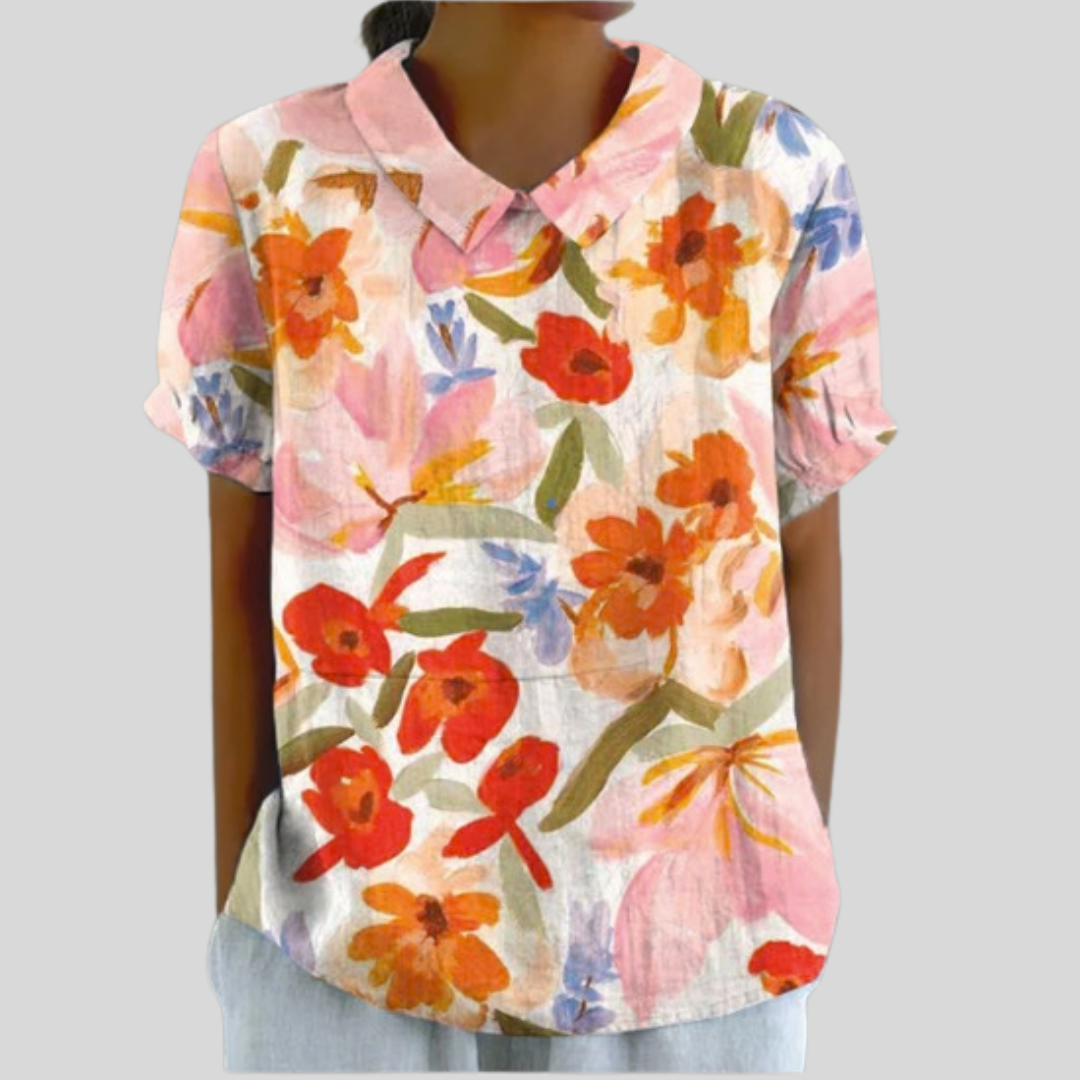 Blouse à manches courtes Évelyne, encolure en V, motifs floraux multicolores sur fond clair