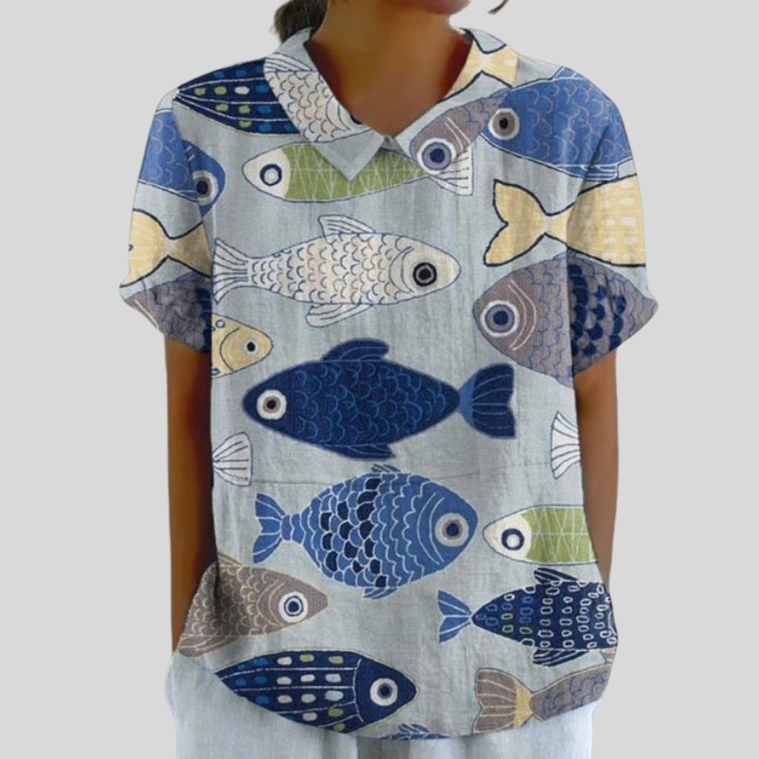 Blouse manches courtes à col, motif poissons multicolores sur fond clair