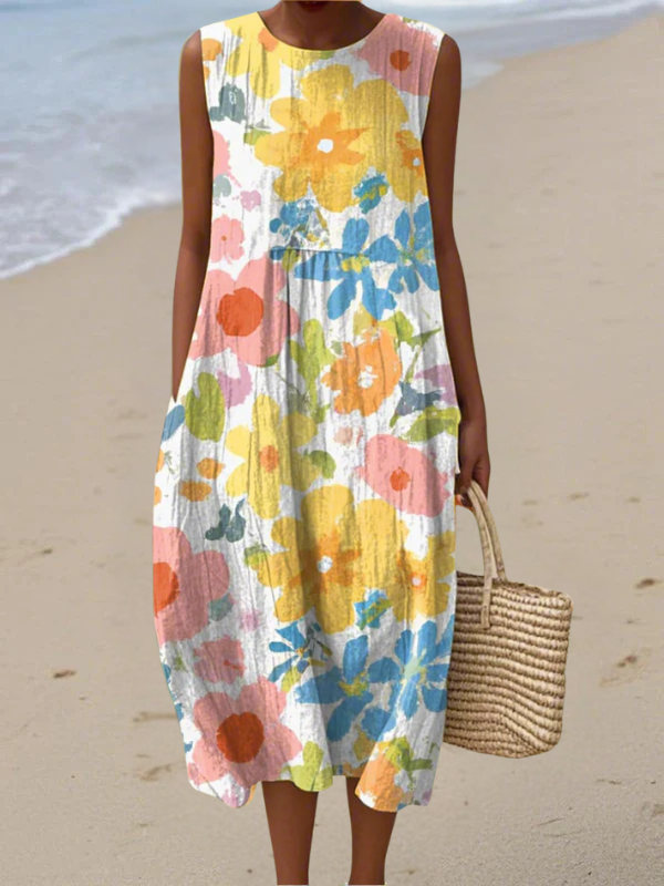 Robe midi fleurie pastel sans manches à col rond, tissu léger, motif coloré.