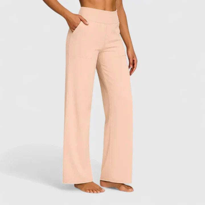 Pantalon confortable crème à jambes évasées, taille haute et poches latérales