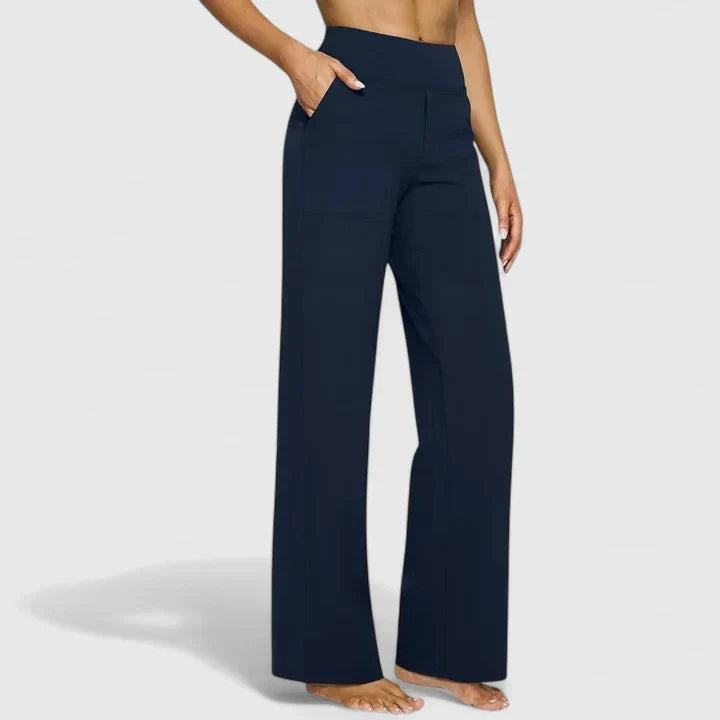 Pantalon confortable bleu foncé à jambes évasées, taille haute, poches latérales