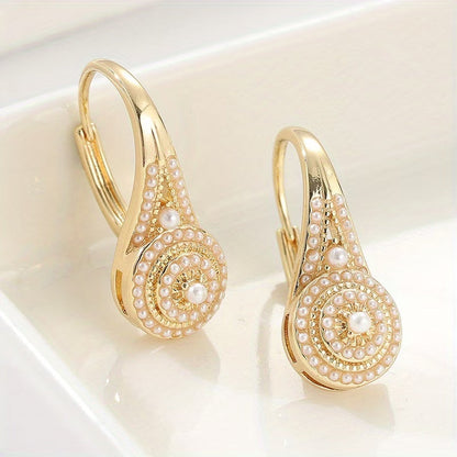 Boucles d’oreilles créoles dorées perle, motif en goutte serti de perles