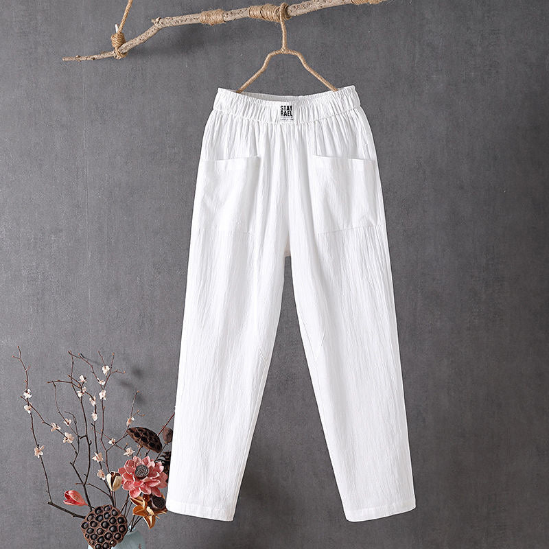 Pantalon ample blanc à taille élastique et poches plaquées
