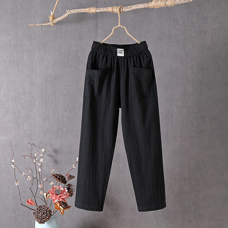 Pantalon ample noir à taille élastique et poches plaquées