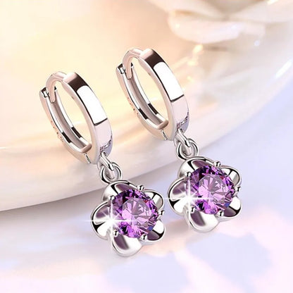Boucles d’oreilles en argent, créoles avec zircon violet et breloque fleur