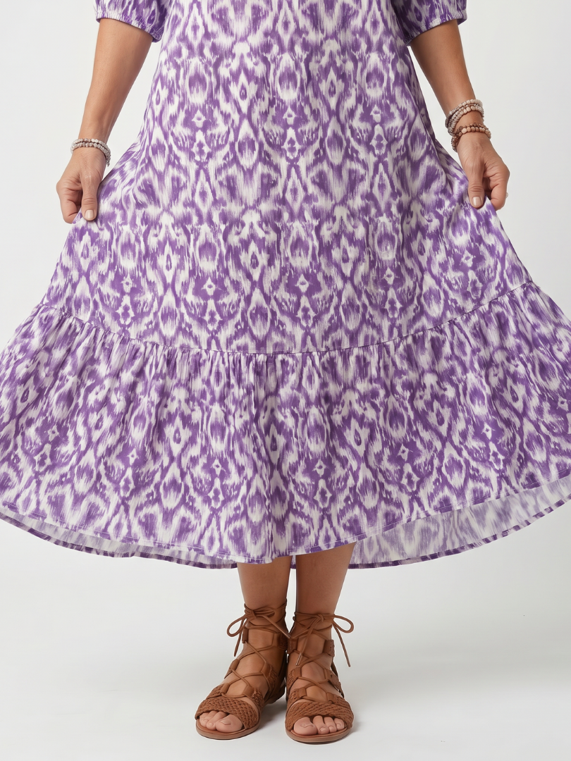 Robe midi violette imprimée, ourlet évasé et volant
