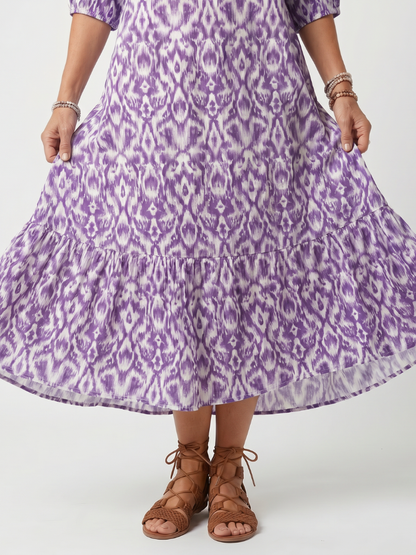 Robe midi violette imprimée, ourlet évasé et volant