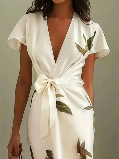 Robe portefeuille blanche à manches courtes, décolleté V, nœud à la taille, motif feuilles