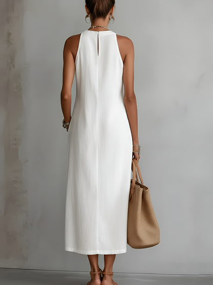 Robe midi en lin blanche, sans manches, col Mao, dos boutonné, fente latérale.