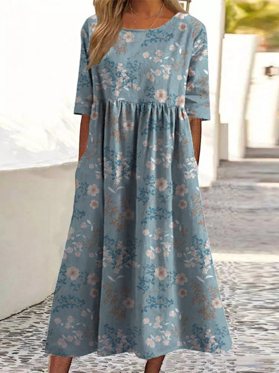 Robe midi ample bleu clair, manches courtes, imprimé fleurs, taille froncée